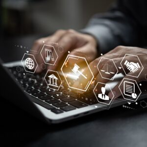 Businessman using digital technology laptop computer law innovation technology of law concept.