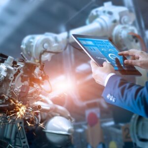 Manager engineer check and control automation robot arms machine