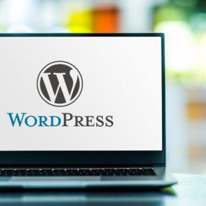 Laptop computer displaying logo of wordpress